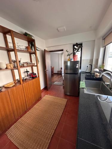 Kuchyň nebo kuchyňský kout v ubytování Sattya Apartment