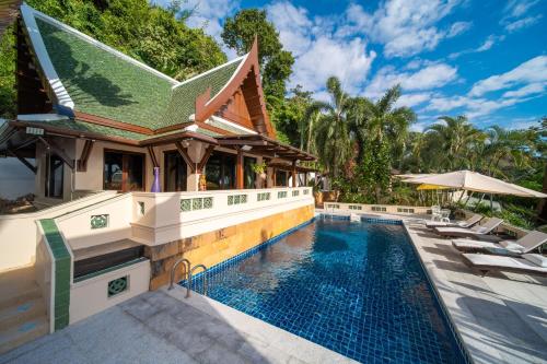 an image of a swimming pool at a villa at D Villa Phuket - Luxury 6 Bedroom Private Pool Villa in Cape Panwa in Phuket