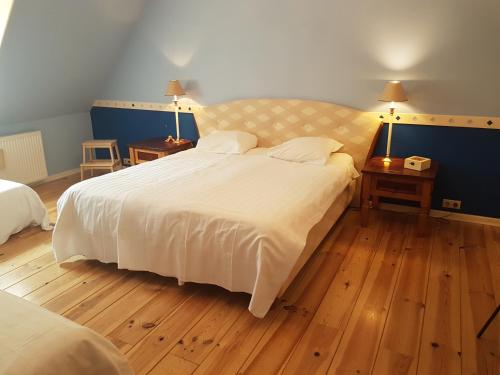Ένα ή περισσότερα κρεβάτια σε δωμάτιο στο Bed & Breakfast De Koegang