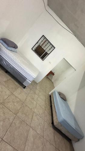 Llit o llits en una habitació de Tu refugio tranquilo