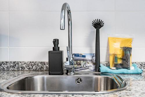 a kitchen sink with a faucet next to a sink at EG5.4A - Luxury Penthouse with Private Sun Terrace in Estepona