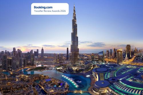 a view of a city with a tall building at Burj Royale - Luxury Stay with Panoramic Burj Khalifa & Fountain View in Dubai
