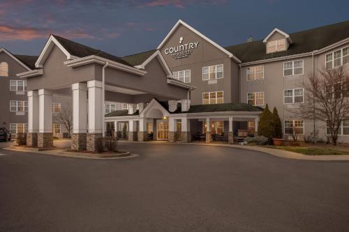 a rendering of a hotel with a parking lot at Country Inn & Suites by Radisson, Beckley, WV in Beckley