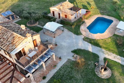 K06 - Trilocale Rosmarino, porzione di villa con piscina