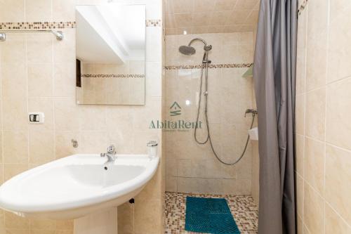 a bathroom with a sink and a shower at Casa di Ponente - Gallipoli in Gallipoli