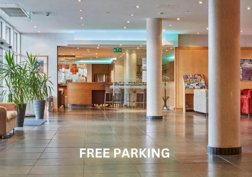 a lobby of a store with a free parking at Future Inn Plymouth in Plymouth