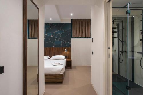 a bedroom with a bed and a shower at The Place in Milan