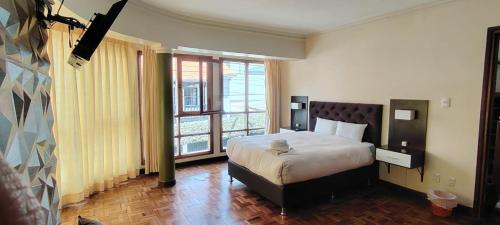 מיטה או מיטות בחדר ב-Hotel RustiCall