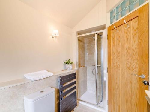 a bathroom with a shower and a sink at 2 Bed in York oc-81551 in Welburn