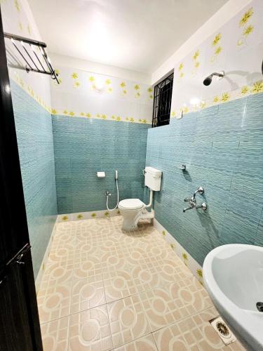 a bathroom with a toilet and a sink at A La Mer - Solis 3 in Varca