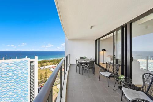 a balcony with a view of the ocean at Ocean View 3-Bed with Gym, Pool, Sauna & Parking in Gold Coast