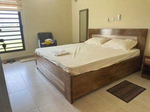 Llit o llits en una habitació de Villa REGO