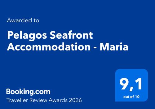 a blue sign with the words pasago reliant association maratha at Pelagos Seafront Accommodation - Maria in Myrties
