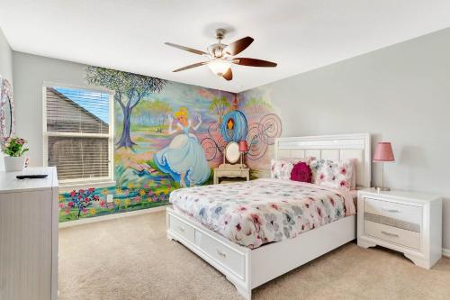 a bedroom with a disney mural on the wall at Ev1339 - Sunset Palm Retreat in Davenport