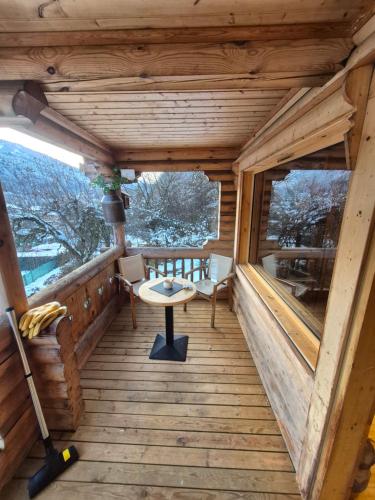 a view of the deck of a tree house at le chalet in Planay