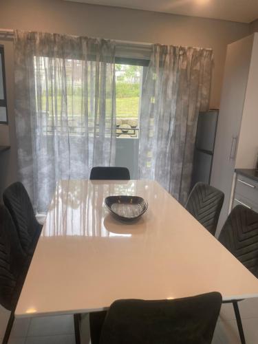 Зображення з фотогалереї помешкання Town apartment у місті Мбабане