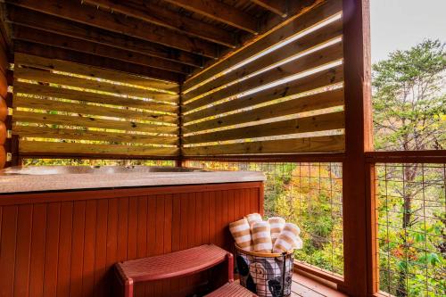a screened in porch with a sink and a window at Family Haven by Dollywood - Hot Tub - Game Room in Pigeon Forge