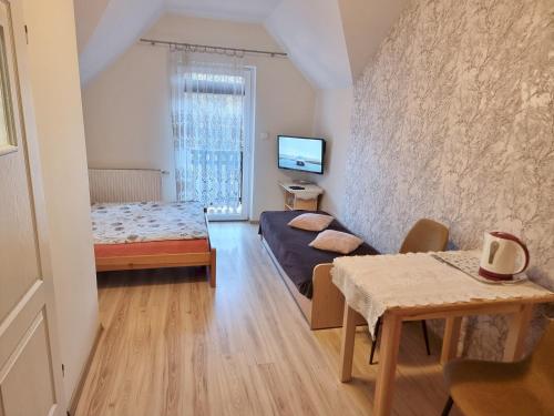 Pokoje Gościnne "Adam"