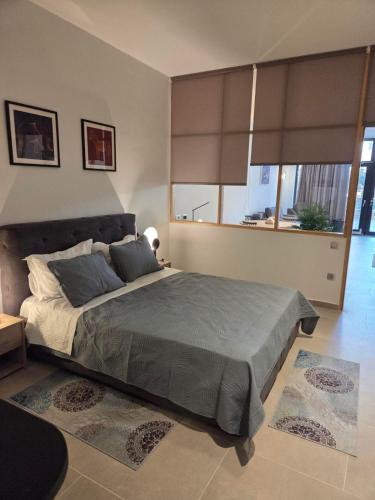 Llit o llits en una habitació de Karatza's suite