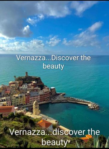 a view of a city over the water at La Scala Vernazza CinqueTerre in Vernazza