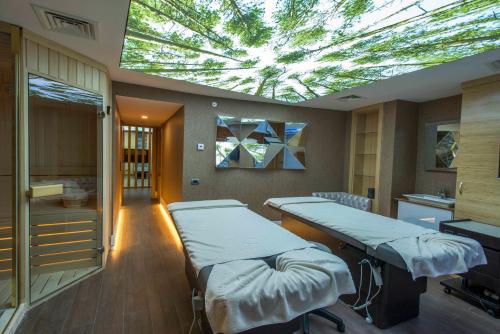 Ένα ή περισσότερα κρεβάτια σε δωμάτιο στο Latanya Hotel Ankara