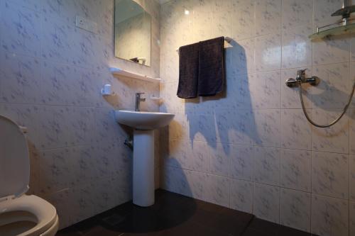 Ein Badezimmer in der Unterkunft Flamingo Guest house