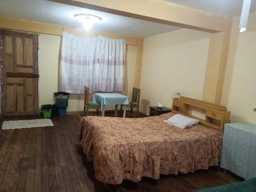 Llit o llits en una habitació de TyR