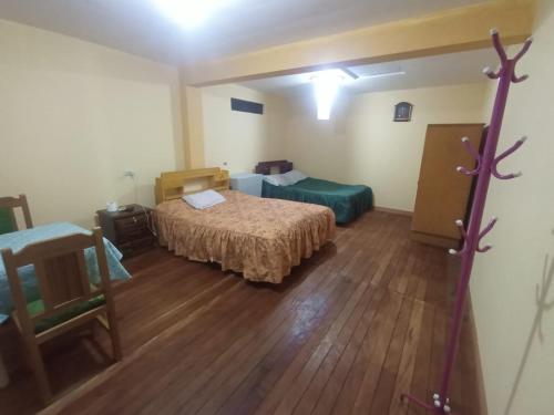 Llit o llits en una habitació de TyR