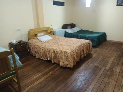 Llit o llits en una habitació de TyR