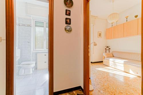 a bathroom with a toilet in a room at Casa Patrizia by PortofinoVacanze in Rapallo