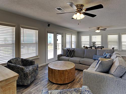 a living room with a couch and a table at Bets Kept Secret in Fort Morgan