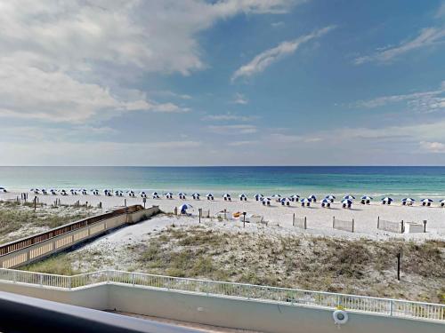a view of a beach with a group of people at Island Echos #3K in Fort Walton Beach