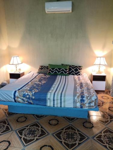 Llit o llits en una habitació de Beach house Bris'C