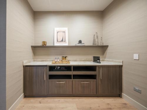 a bathroom with a sink and a counter at Stay One Chicago in Chicago