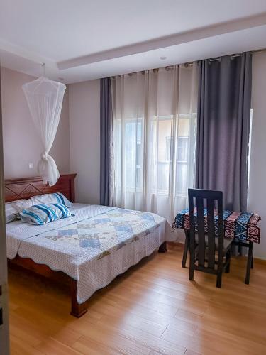 Llit o llits en una habitació de Positive House
