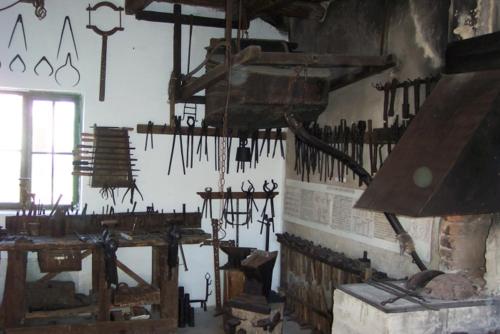 a room filled with lots of different types of tools at Wellness Apartments in Velence in Velence