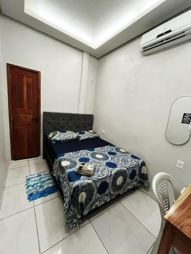 a bedroom with a bed in a room at Hotel Big Burg in Breves