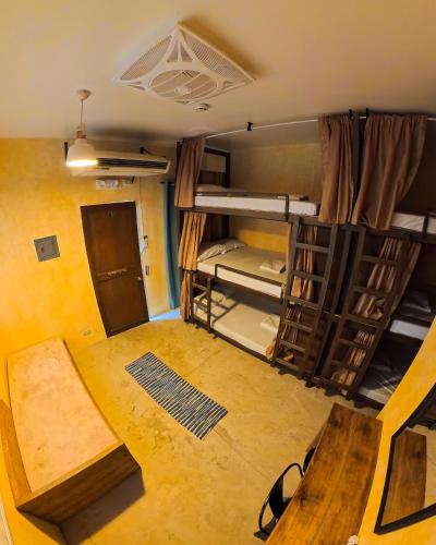 an overhead view of a room with bunk beds at The Shack Hideaway by Mayumi Resorts in Mabini