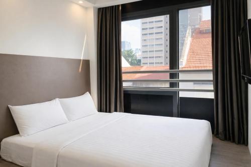 Krevet ili kreveti u jedinici u okviru objekta A Hotel Dickson