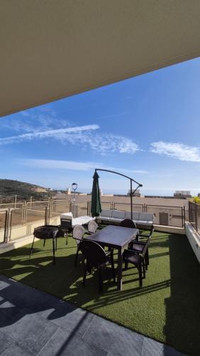 Adosado familiar 160 m, 2 piscinas, vistas al mar y montaña, 7 personas, wifi, mascotas, cuna