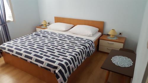 Katil atau katil-katil dalam bilik di Matušanka Apartment