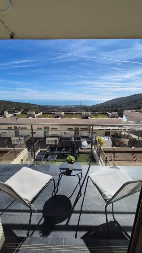 Adosado familiar 160 m, 2 piscinas, vistas al mar y montaña, 7 personas, wifi, mascotas, cuna