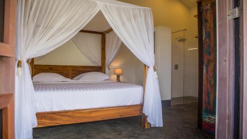 Postel nebo postele na pokoji v ubytování Windhoek Resort Bonaire