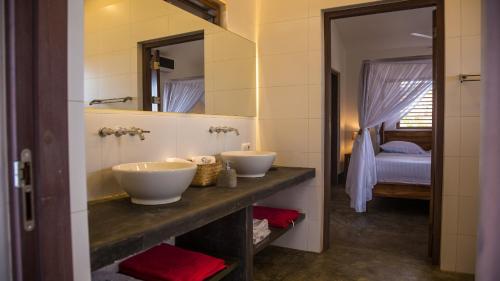Postel nebo postele na pokoji v ubytování Windhoek Resort Bonaire