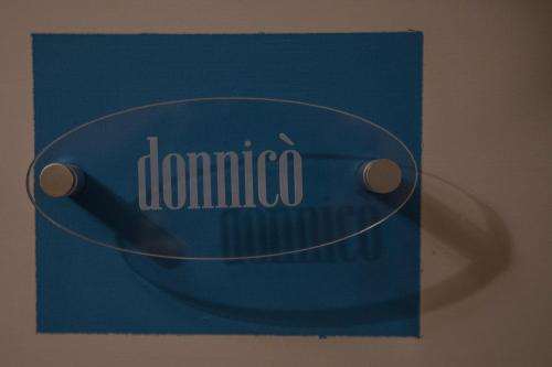 a blue card with the word dominico on it at Palazzo Tronconi agriturismo in Arce