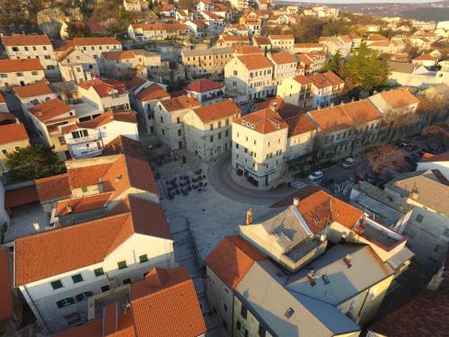 an aerial view of a city with buildings at Villa Matko - family destination in Zmijavci