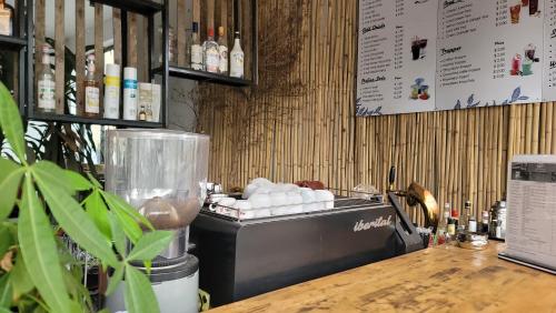 a counter top with a blender on a table at Park Inn Boutique and Hostel in Kampot
