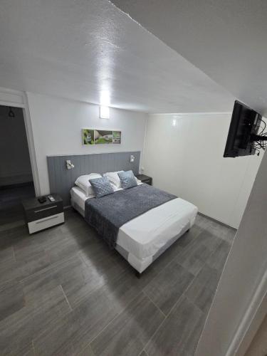 Llit o llits en una habitació de Gite thérèse LAMENTIN
