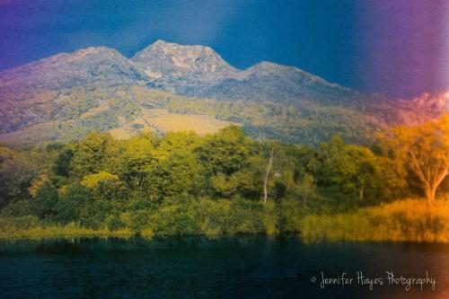 a view of a mountain with trees and a lake at Morino Lodge - Myoko in Myoko