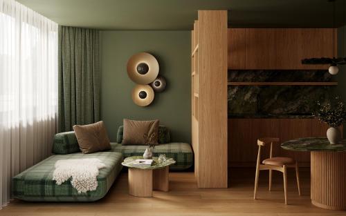 a living room with a couch and a table at Post Residence - Home of Memories - Dolomites in San Candido